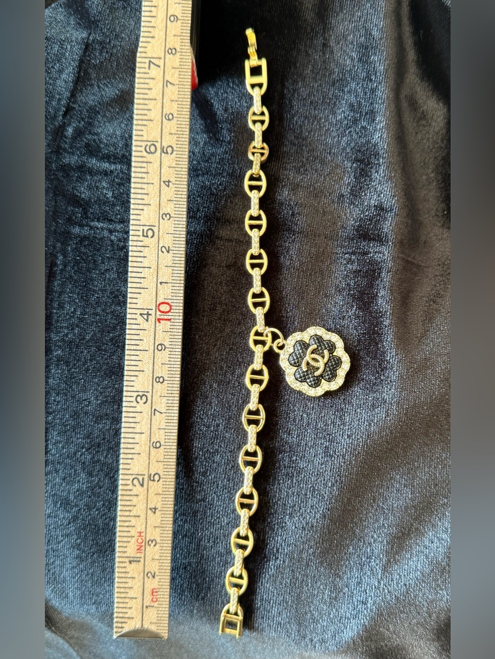 Gold-Tone Pig ๐ฝ Nose Link Bracelet with Black CHANEL Camellia Charm - Picture 3 of 9
